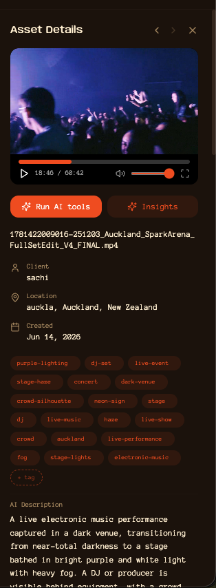 asset details panel: a video of a live show at Spark Arena Auckland with auto-generated tags like purple-lighting, live-event, dark-venue, crowd-silhouette
